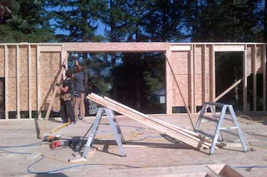 Custom builders install wood framing for new home