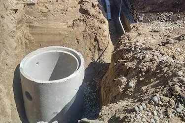 Catch basin drainage system installed into trench