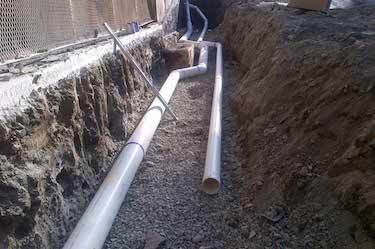 Piping placed into large trench