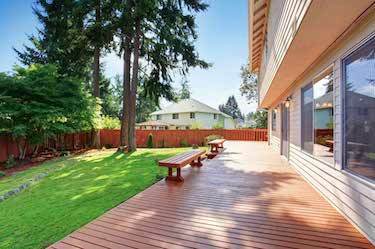 Backyard deck with benches installed