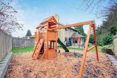 Children's backyard playground hardscape