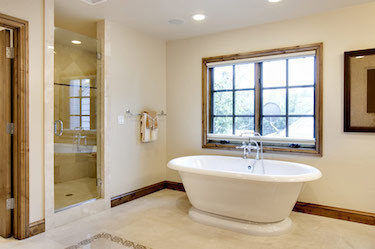 Beautiful rustic bathroom with separate tub