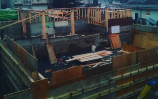 Overhead view of construction site during installation of a concrete foundation