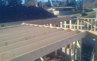 Framing floor joist installation of a house in Burnaby
